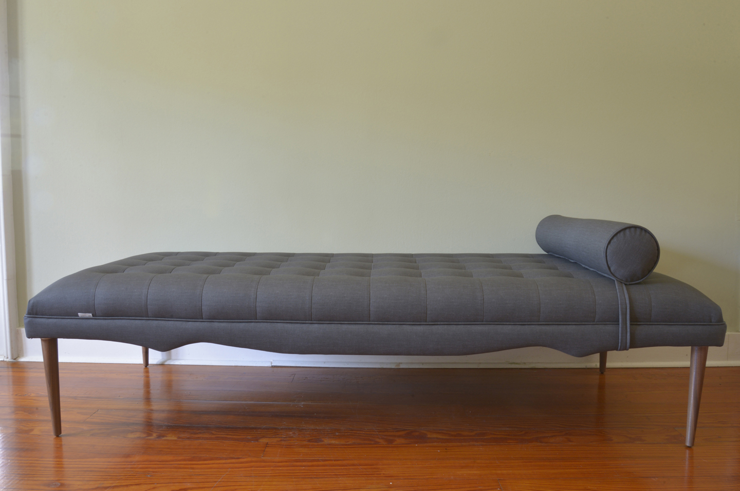 The Sublime daybed with dark Texian legs